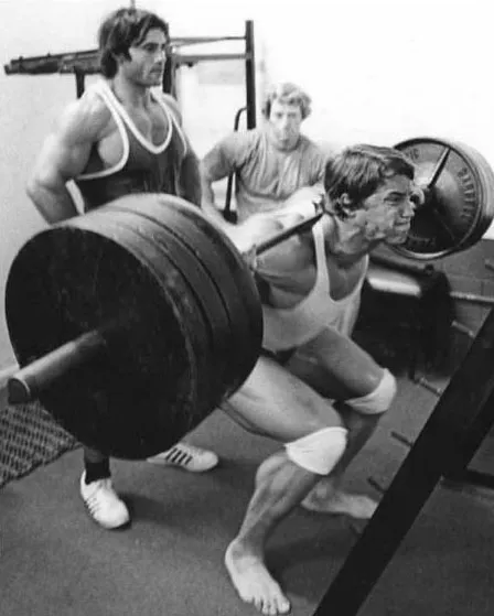 Arnold Schwarzenegger Squatting