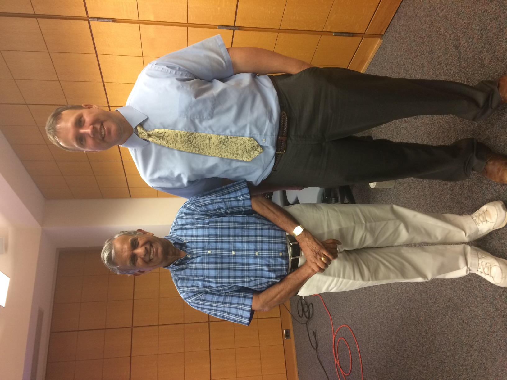 Aaron Sims alongside his mentor
