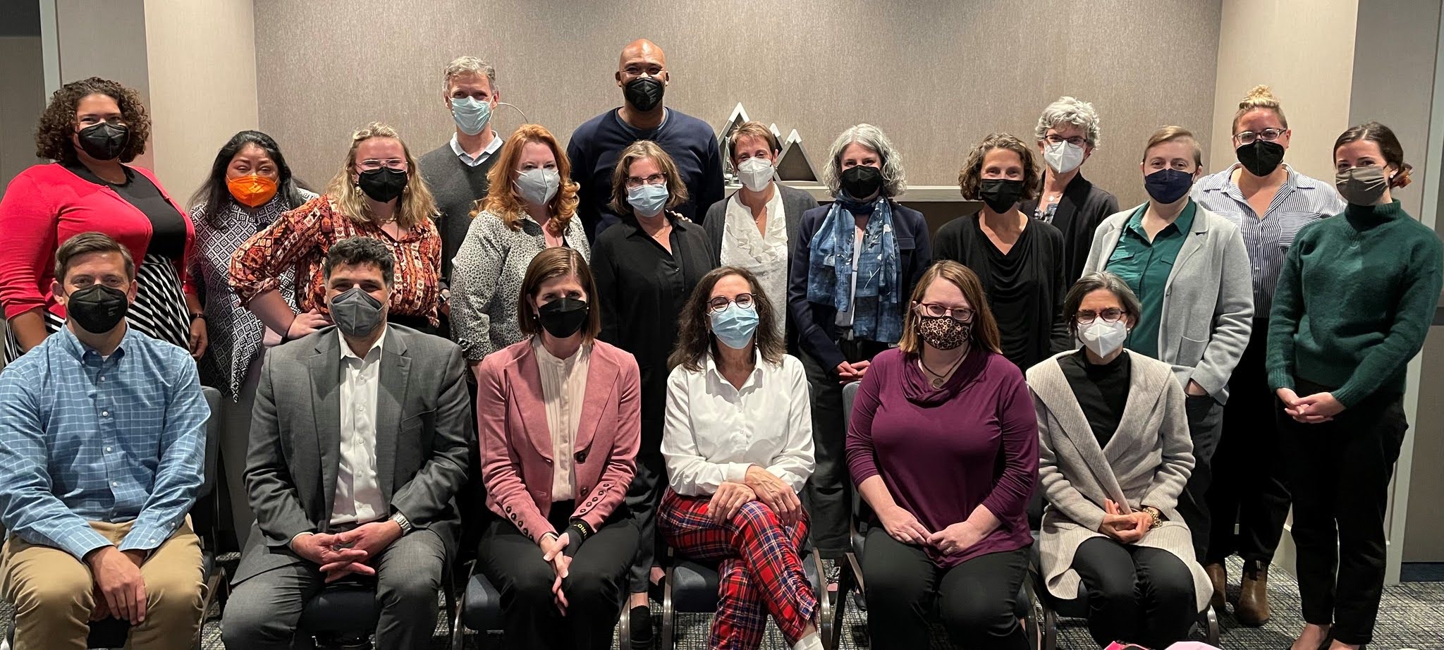 Professional colleagues gathered for an ethics leadership meeting